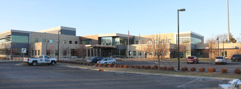 Richfield's municipal building in the fall, with early morning light