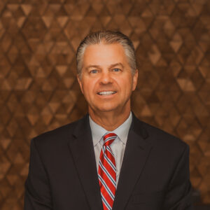 Headshot photograph of Dave Unmacht.