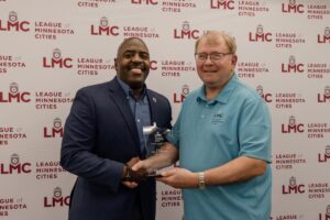 D. Love and Ron Johnson are pictured at the May LMC Board of Directors meeting.