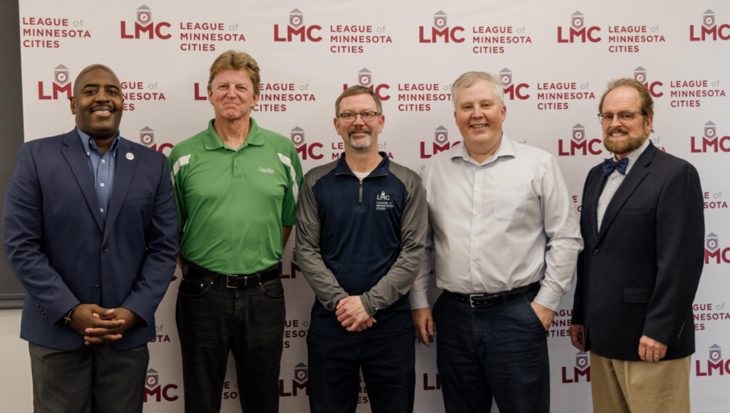 D. Love, Rick Schultz, Clinton Rogers, Craig Clark, and Jeff Pilon are pictured at the May LMC Board of Directors meeting