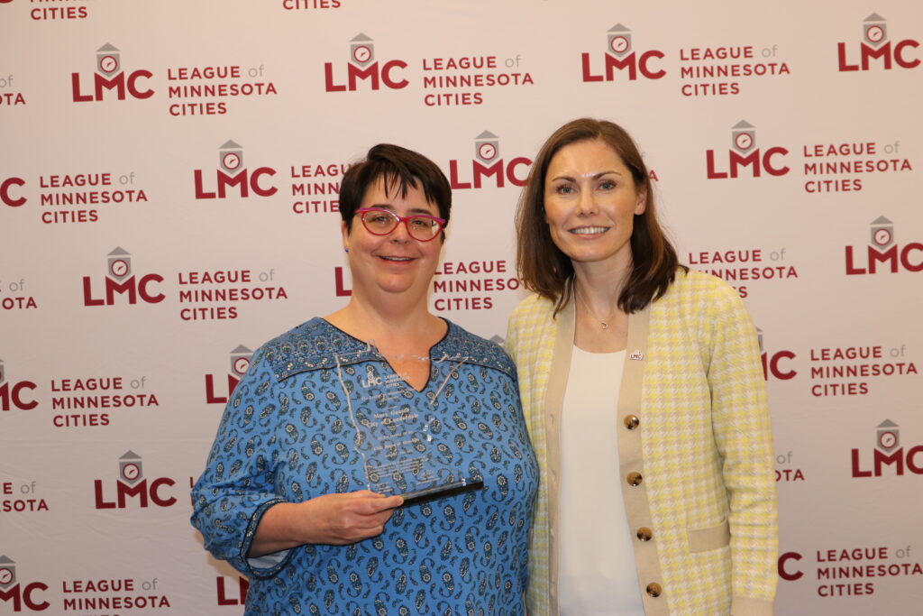 Former Board of Directors member Mary Gaasch and President Jenny Max are shown.