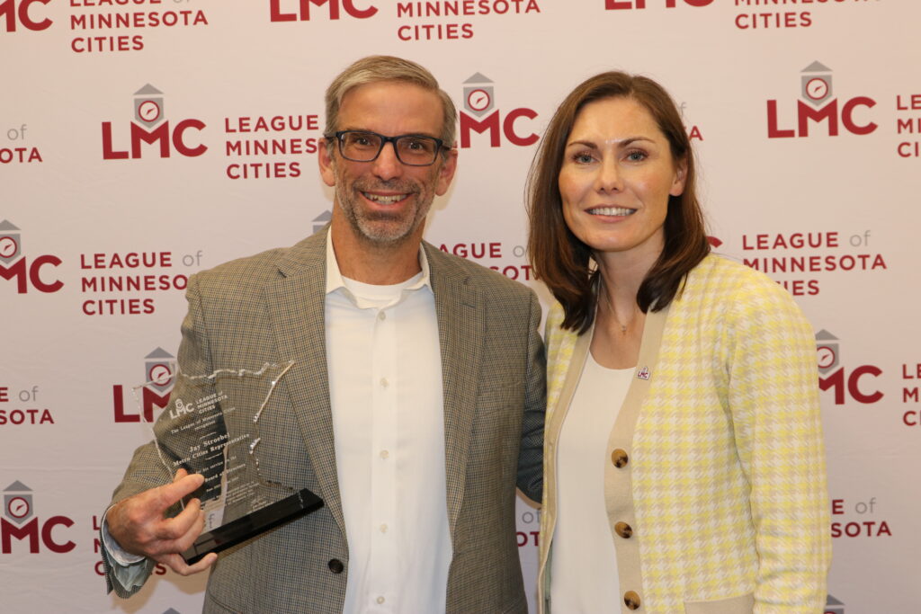 Former LMC Board of Directors member Jay Stoebel and President Jenny Max are shown.