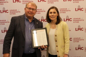 Past LMC Board of Directors President Ron Johnson and Outgoing President Jenny Max are shown.