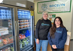 Two Bricelyn Food Pantry employees.