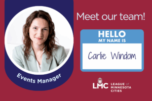 Graphic shows a headshot of LMC Events Manager Carlie Windom with her title of "Events Manager" in text below her photo set on a red and blue background. To the right, text reads "Meet our team!" over a graphic of a light blue and white nametag that reads "Hello my name is Carlie Windom" above the LMC logo