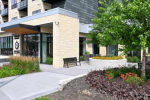 Side view of Columbia Heights City Hall in July of 2024, after new plants had been placed in the city hall garden.