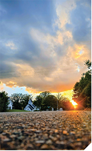 A sunrise in a rural countryside.