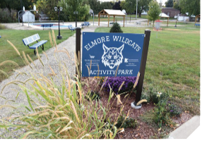 A park sign that reads Elmore Wildcats Activity Park