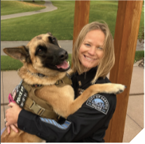 Officer and K-9 dog.